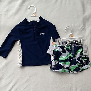 Rashguard and shark swim trunks